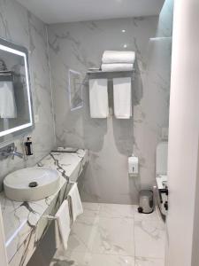 Ένα μπάνιο στο Metro Hotel Terminal