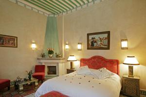 Postel nebo postele na pokoji v ubytování Riad & Spa Esprit Du Maroc