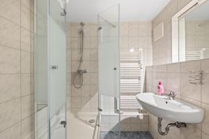 Koupelna v ubytování Hotel Comenius