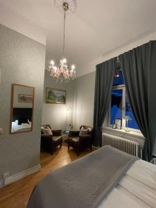 Postel nebo postele na pokoji v ubytování Lilla Hotellet