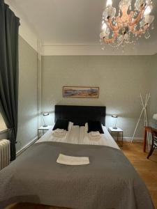 Postel nebo postele na pokoji v ubytování Lilla Hotellet
