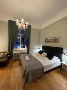 Postel nebo postele na pokoji v ubytování Lilla Hotellet