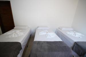 Postel nebo postele na pokoji v ubytování Pousada Girassol
