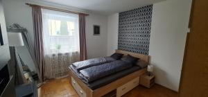 Postel nebo postele na pokoji v ubytování Nomadengold