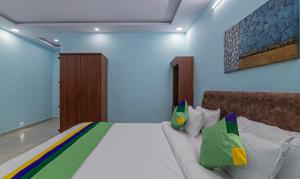 Postel nebo postele na pokoji v ubytování Itsy Hotels Kurinji Stay Inn