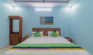 Postel nebo postele na pokoji v ubytování Itsy Hotels Kurinji Stay Inn