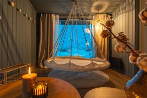 Foto Tromsøs asuva majutusasutuse Aera - Glass cabins galeriist