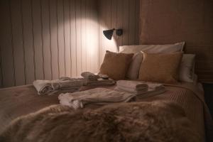 Voodi või voodid majutusasutuse Aera - Glass cabins toas
