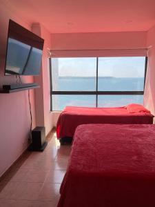 Krevet ili kreveti u jedinici u okviru objekta Apartamento Marina Tower CARTAGENA