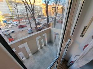 a view of a city street from a window at Family Dreams in Turin