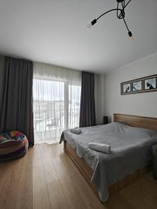Ένα ή περισσότερα κρεβάτια σε δωμάτιο στο Vista Gudauri Apartment 25