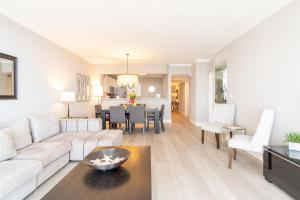 a living room with a couch and a table at Golden Bay 808 in Miami Beach