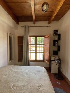 Кровать или кровати в номере Zoola Suites Antigua