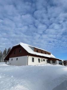 Apartmány v Chalupě nad Modravou v zimě