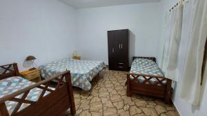 Ένα ή περισσότερα κρεβάτια σε δωμάτιο στο Casa Kassel