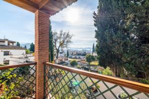 a balcony with a view of a city at Luminoso Alhambra View Suite - El Laurel in Granada