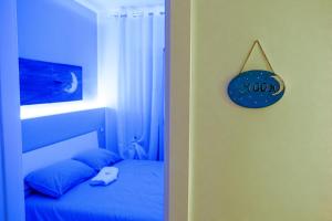 Postel nebo postele na pokoji v ubytování SUN & MOON B&B