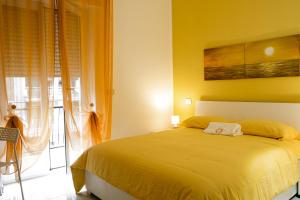 Postel nebo postele na pokoji v ubytování SUN & MOON B&B