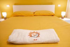 Postel nebo postele na pokoji v ubytování SUN & MOON B&B