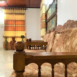 Χώρος καθιστικού στο Grand Refuge Holiday Rooms