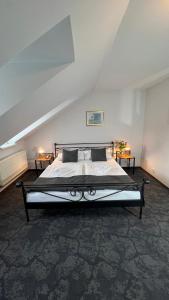 Ένα ή περισσότερα κρεβάτια σε δωμάτιο στο Hotel Boston