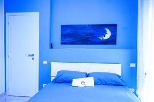 Postel nebo postele na pokoji v ubytování SUN & MOON B&B