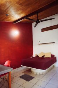 Łóżko lub łóżka w pokoju w obiekcie Pacific Buddha