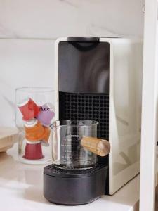 a blender on a counter in a microwave at Seoul National University Apartment in Seoul