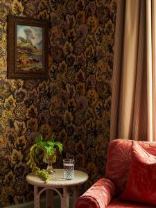 a living room with a table and a couch at Marine North Berwick in North Berwick