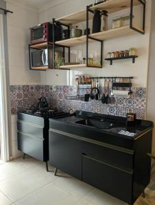 Η κουζίνα ή μικρή κουζίνα στο Cantinho Estilo