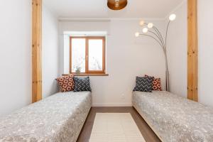 Krevet ili kreveti u jedinici u okviru objekta Nice holiday home in Turaida