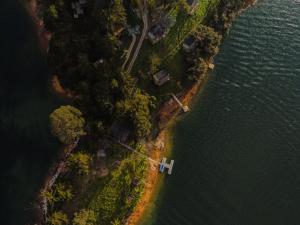 an aerial view of an island in the water at La Pausa Hotelbistro in Guatapé