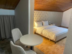 Voodi või voodid majutusasutuse four generation hotel toas