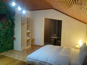 Voodi või voodid majutusasutuse four generation hotel toas