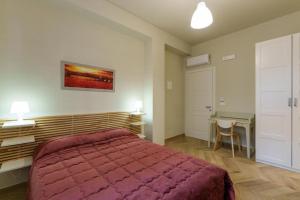 Postel nebo postele na pokoji v ubytování B&B Beatrice