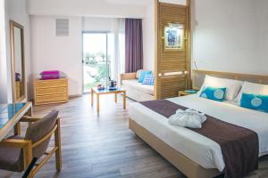 Voodi või voodid majutusasutuse Baia di Conte Resort toas
