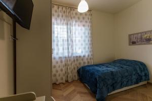 Postel nebo postele na pokoji v ubytování B&B Beatrice + 10 fotografií