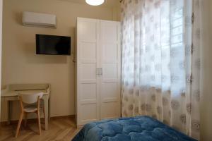 TV a/nebo společenská místnost v ubytování B&B Beatrice