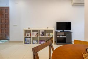 Μια τηλεόραση ή/και κέντρο ψυχαγωγίας στο Calonge a 17mts de la playa