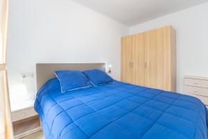 Ένα ή περισσότερα κρεβάτια σε δωμάτιο στο Calonge a 17mts de la playa