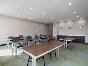 a classroom with tables and chairs in a room at Home2 Suites By Hilton Round Rock Medical Center in Round Rock +59 photos
