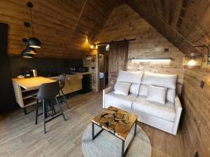 A seating area at Les Flors - Hotel Rural & Cabanyes