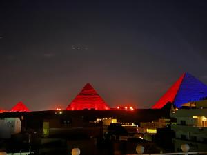 Foto da galeria de Jimmy Pyramids Hotel no Cairo
