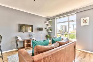 Ein Sitzbereich in der Unterkunft Beautiful studio in convenient Green Point