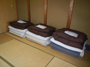 Katil atau katil-katil dalam bilik di Guest Inn Chita