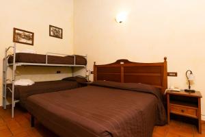 Posteľ alebo postele v izbe v ubytovaní Il Podere Del Germano Reale