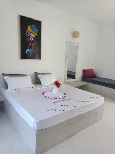 Watamu Ascot Resort客房内的一张或多张床位