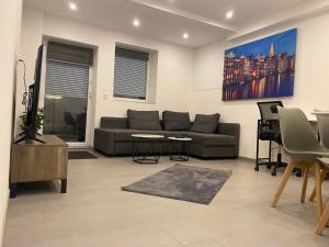 Χώρος καθιστικού στο Apartment Business Suite mit 2 Schlafzimmer & Parkplatz, Highspeed WLAN, Fußbodenheizung & Netflix Premium, Zentral zu Audi & Schwarz Gruppe