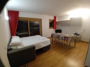 A bed or beds in a room at Residence Rose
