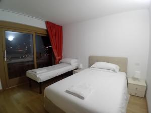 A bed or beds in a room at Residence Rose